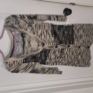 ***Bke button up sweater***