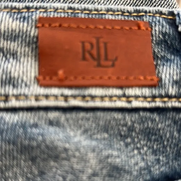 Ralph Lauren Lauren button down denim skirt with Frey hem.