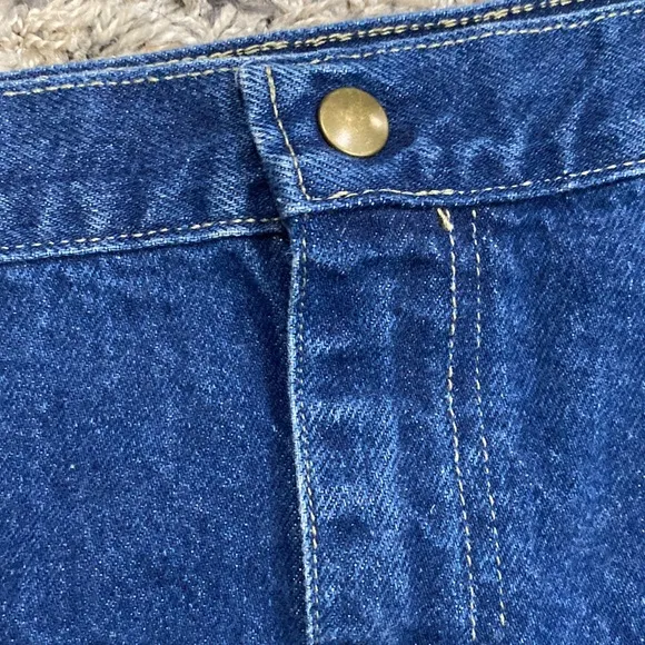 Vintage midi length denim skirt diagonal detail on the back made in USA 18-20