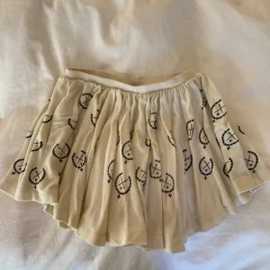 WILDFOX off-white low waisted skirt